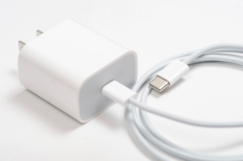 Phone charging cable on a light surface